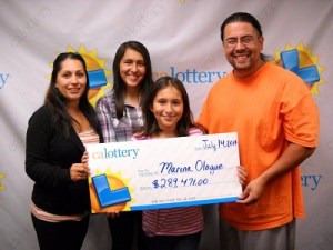 Marina Olague and her family after winning the Super Lotto